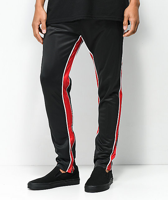 black track pants with red stripe