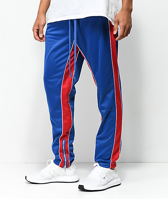 blue track pants with white stripe