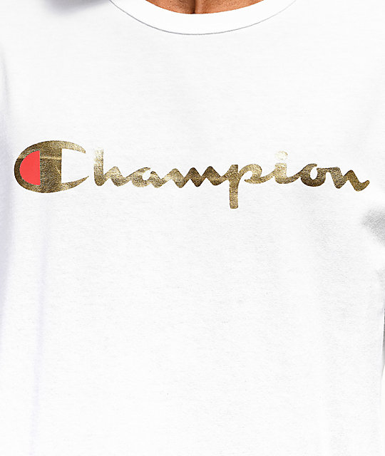 camiseta blanca y dorada