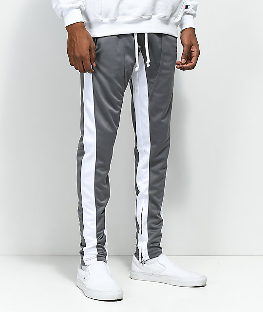 grey and white track pants