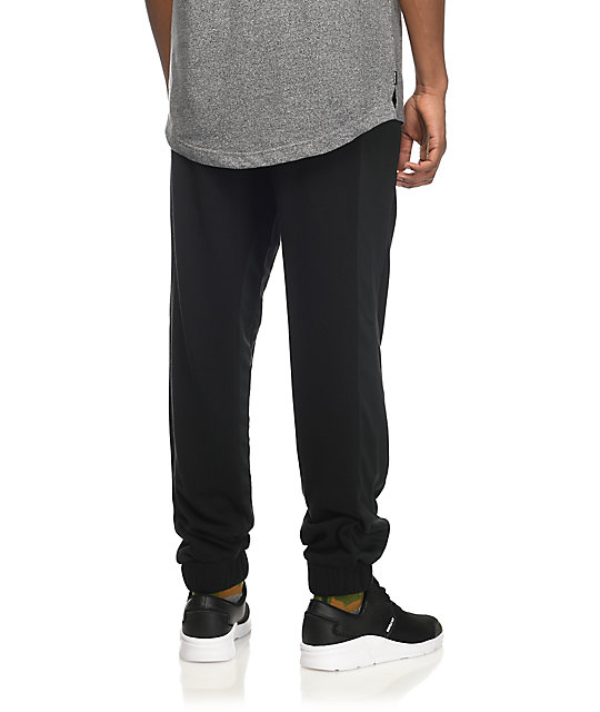 black and grey tech fleece pants