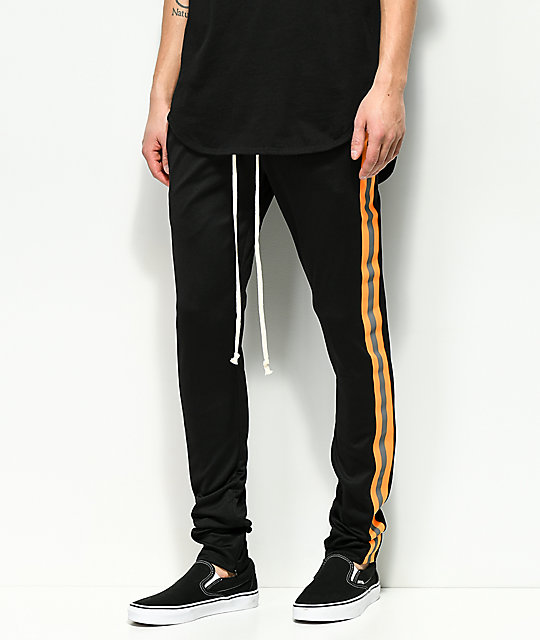 black and orange track pants