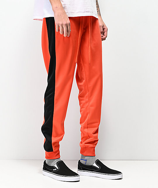 orange and black sweatpants