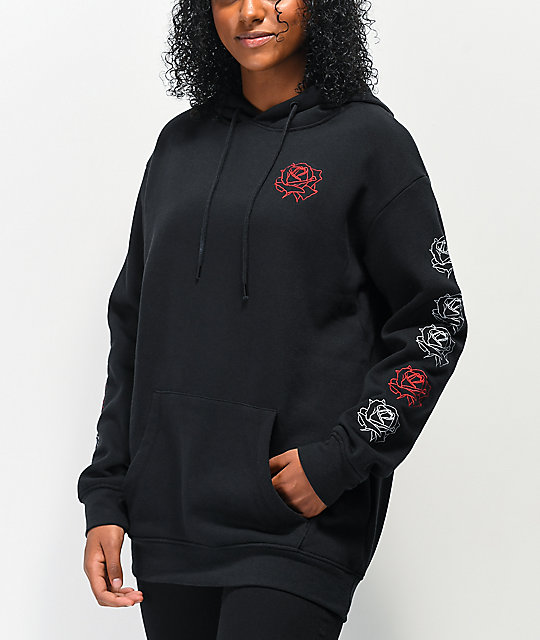 black hoodie with red roses on sleeves