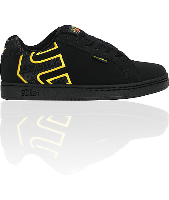 black and yellow etnies