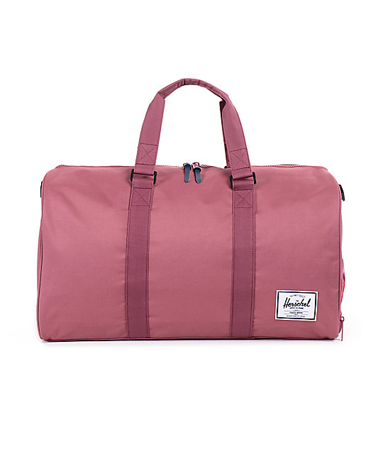 pink herschel duffle bag