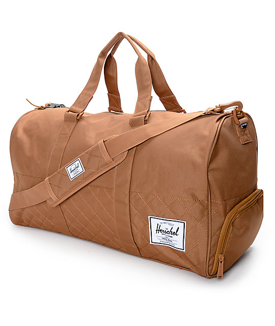 Herschel Supply Co Novel Quilted Caramel 42 5l Duffle Bag Zumiez Herschel Supply Co Novel Quilted Caramel 42 5l Duffle Bag