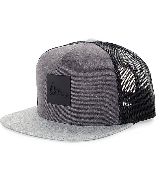 black and grey trucker hat