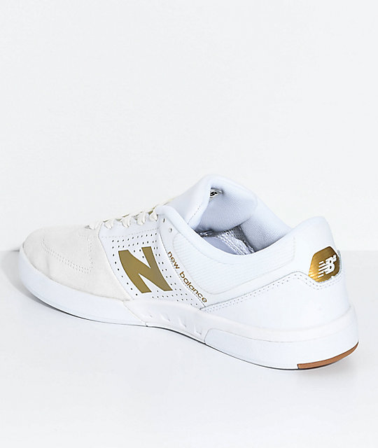 white and gold new balance