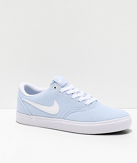 white nike shoes with blue check