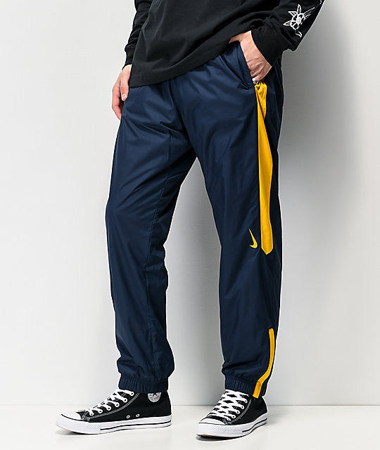 nike track pants navy blue