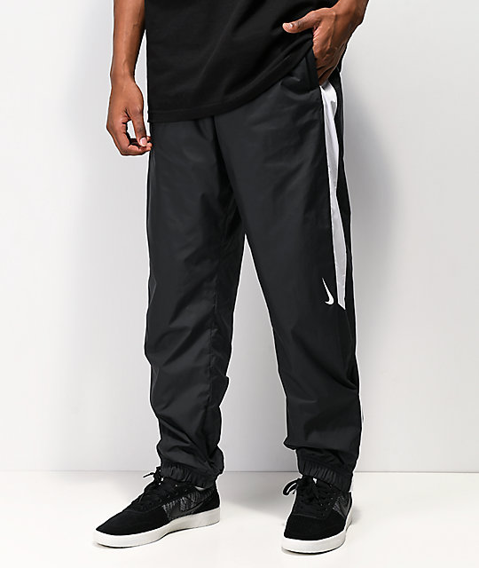 Nike SB Shield Sulfur pantalones de chándal en negro y blanco Nike SB Shield Sulfur pantalones de chándal en negro y blanco