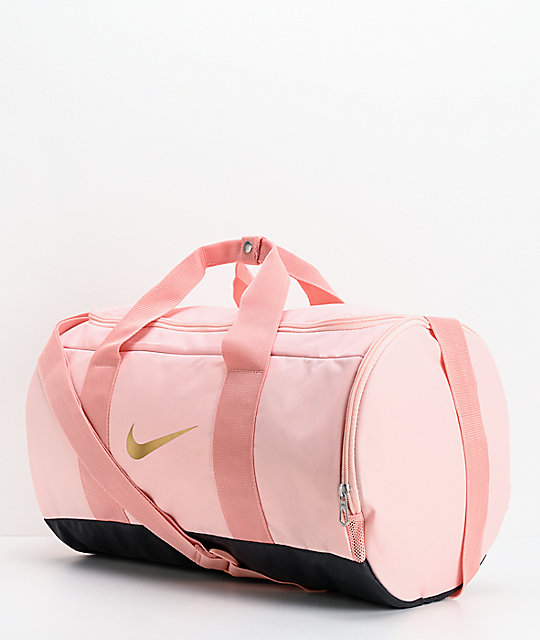 pink and black duffle bag