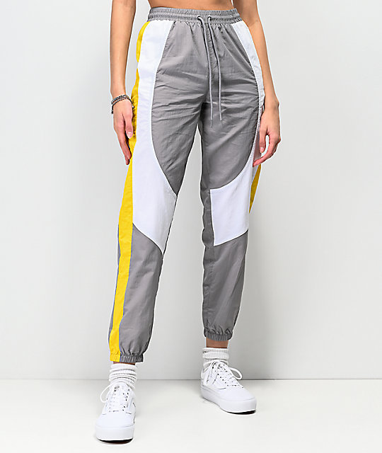 grey and white track pants