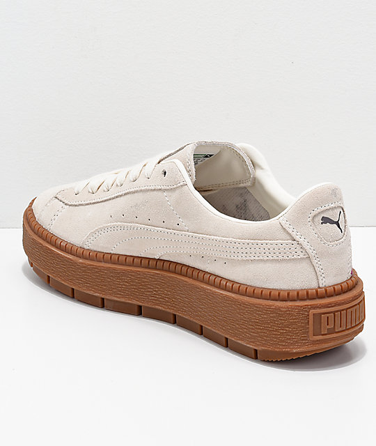 puma suede platforms in white with embrodiery