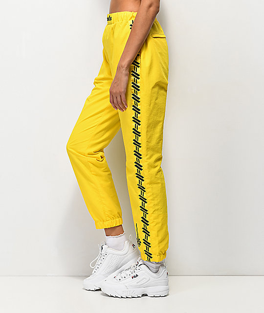 black and yellow sweatpants