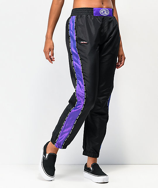 black and purple track pants