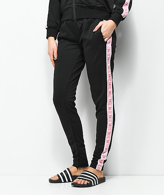 black and pink track pants