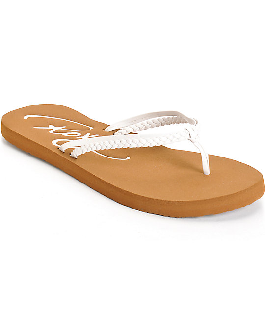 brown and white flip flops