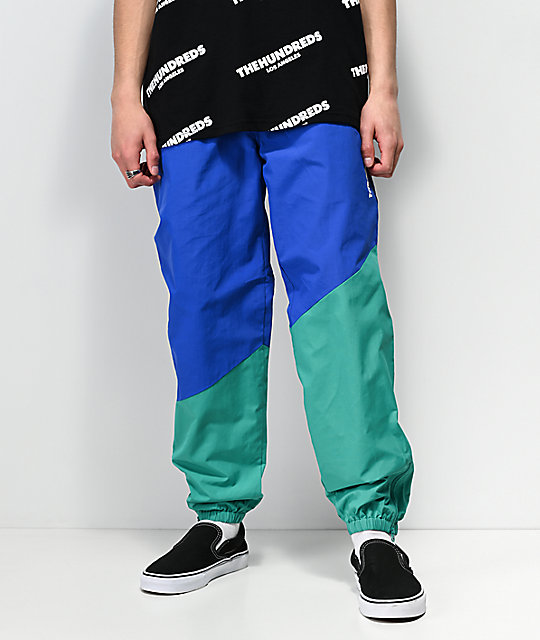 blue nylon track pants