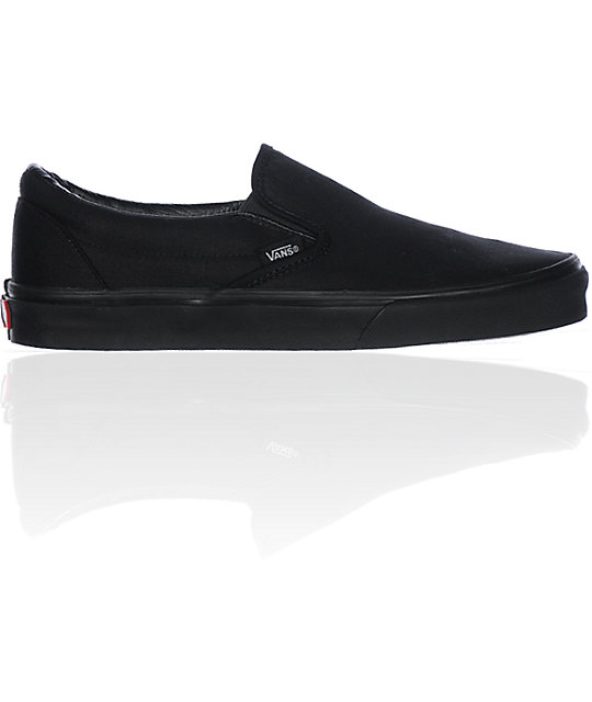 solid black slip on vans