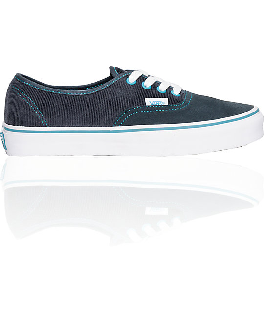 grey vans with blue laces