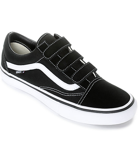 black and white vans with straps cheap 