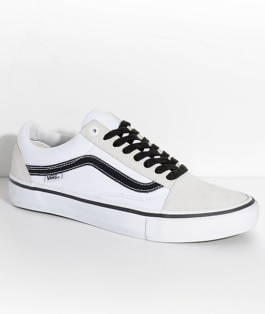 white and black low top vans