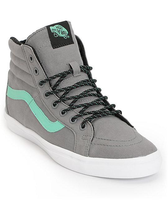 grey and turquoise vans