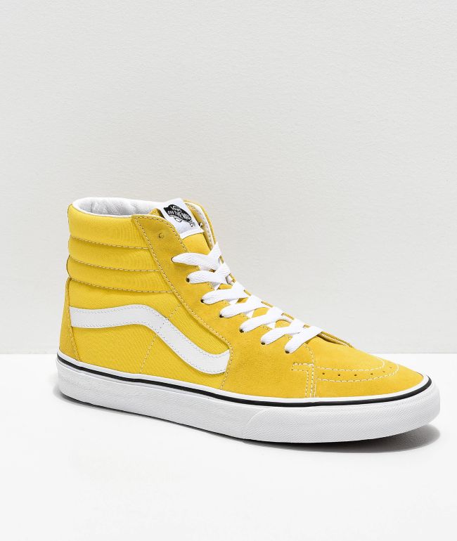 yellow and white high top vans