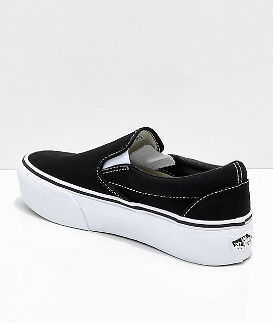 white platform slip on vans