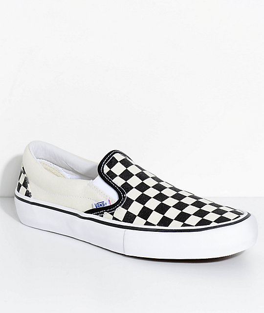 black and white checkerboard vans slip ons womens