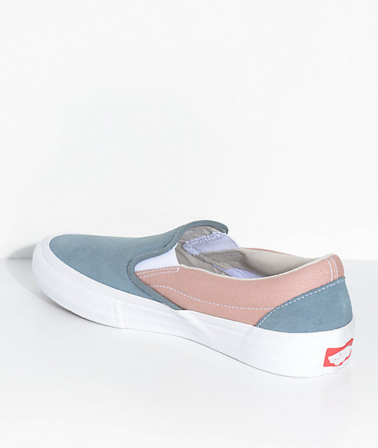 blue and pink vans slip ons