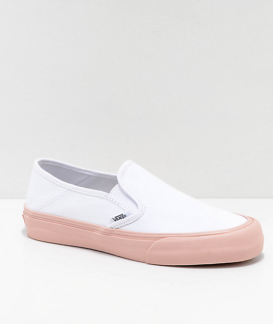 white slip on vans zumiez