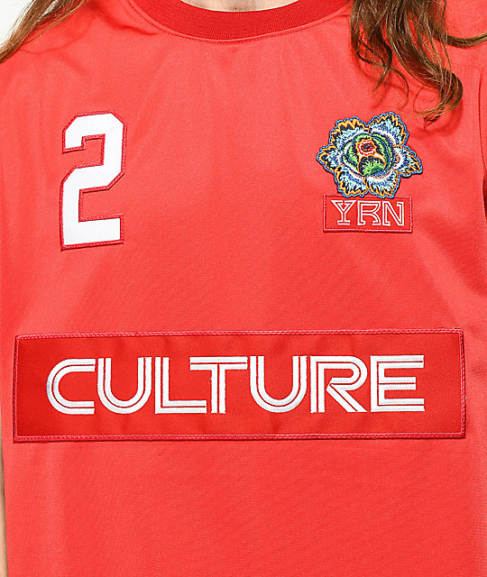 red and white striped soccer jersey
