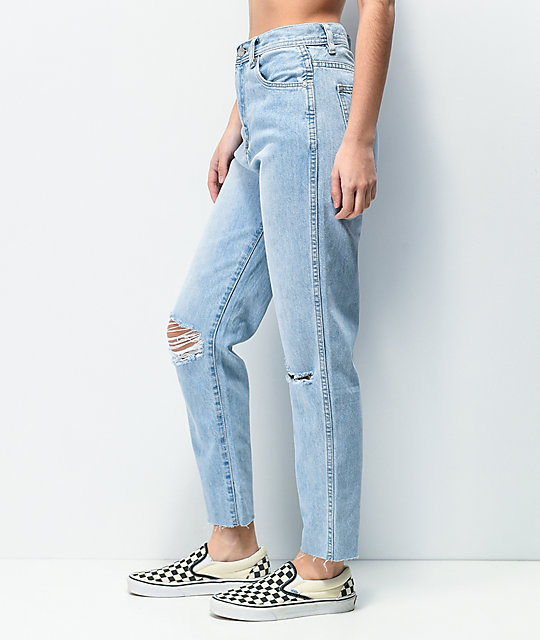 light blue jeans with holes