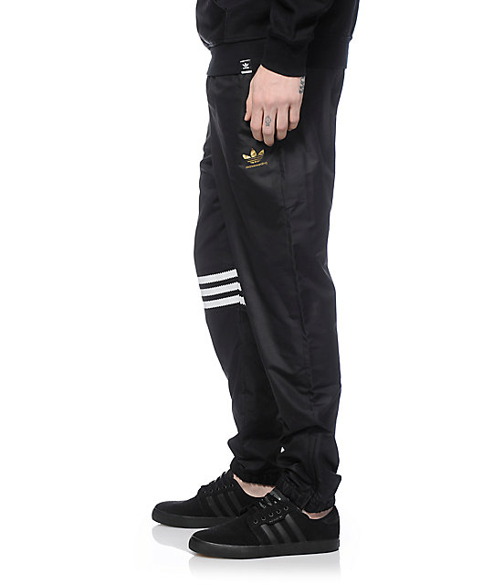 adidas black and gold joggers