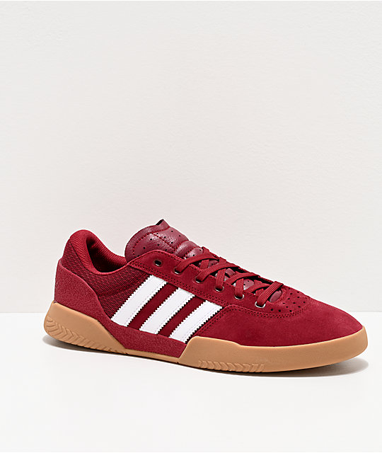 burgundy and white high top adidas