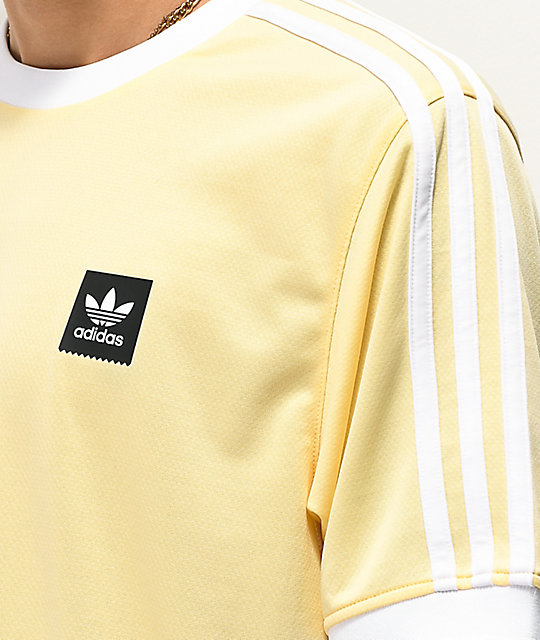 yellow and white adidas shirt