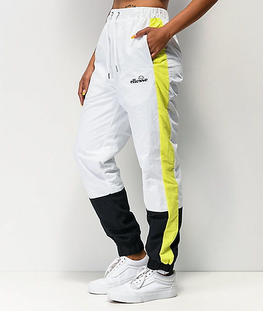 yellow and white track pants
