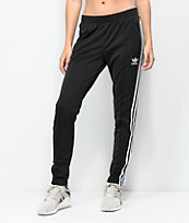 adidas pantalones de chándal en negro con tres rayas