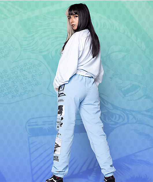 https://scene7.zumiez.com/is/image/zumiez/product_main_medium/Broken-Promises-Social-Media-Drama-Blue-Track-Pants-_333350-alt5-US.jpg