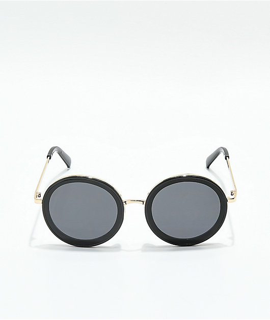 oversized black round sunglasses