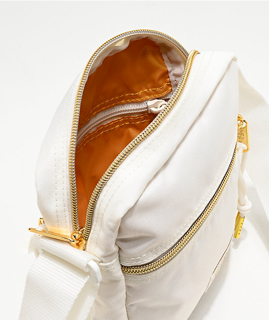 white and gold shoulder bag