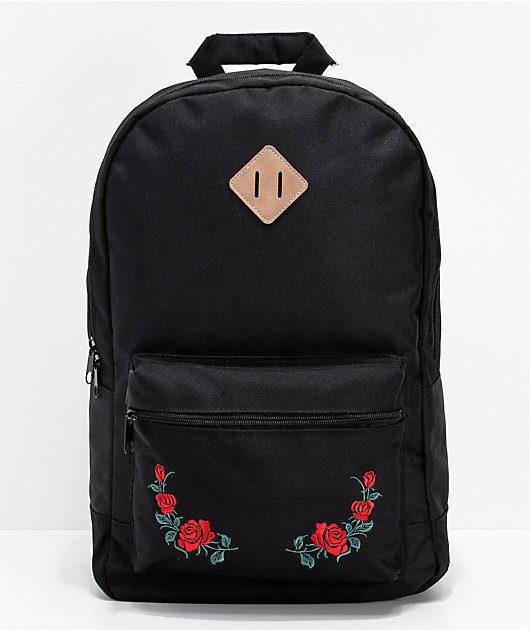 black backpack with roses