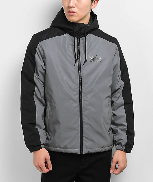 Grey white shop and black windbreaker