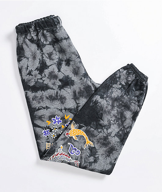 black sweatpants with pink dragons