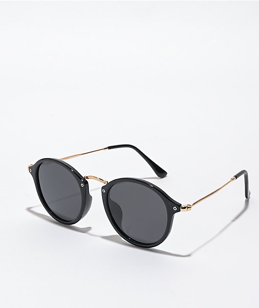 Black and gold hotsell round sunglasses