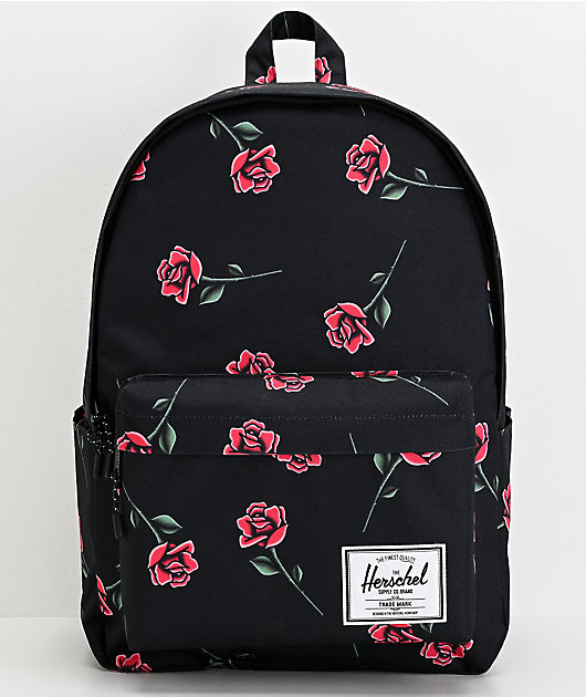 black backpack with roses