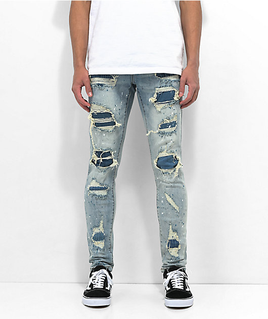 Light blue jeans with rips sales